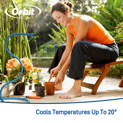 A lady planting flowers outdoors using a personal adjustable mist cooling sprayer that lowers ambient temps up to 20 degrees.