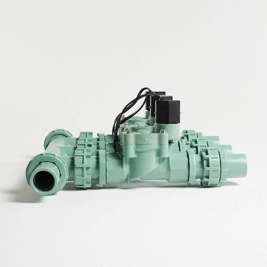 57253 - The preassembled sprinkler valve manifold can connect to both ¾-inch and 1-inch PVC pipes. 