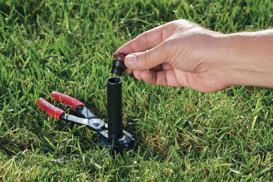 Demonstrating use for Spray Head Pull Up Tool